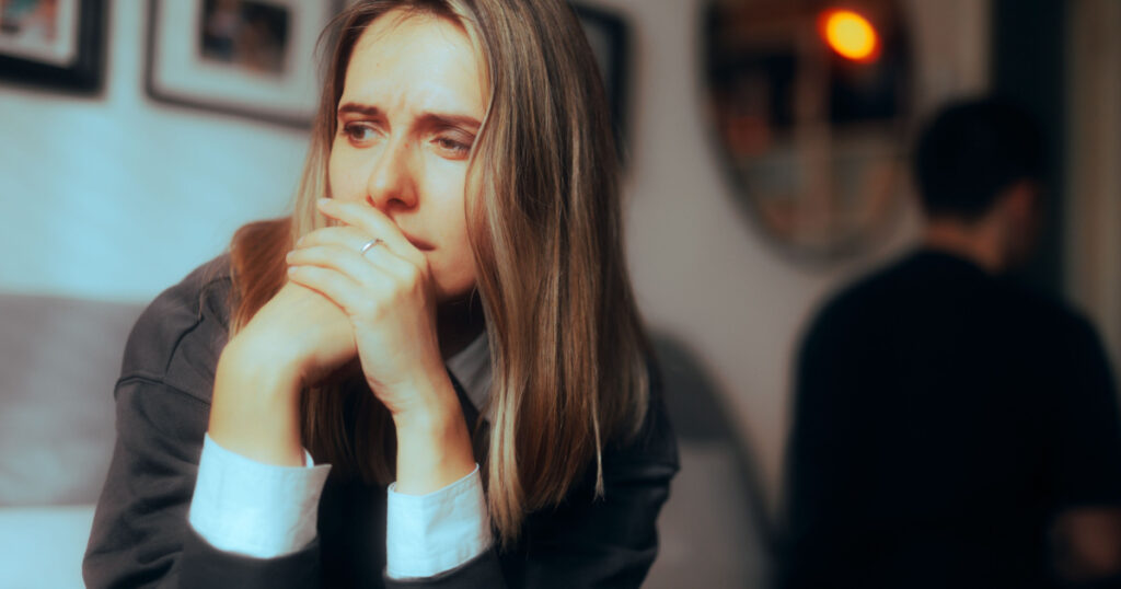 Sad Woman Fighting with her Partner Thinking about Separation. Unhappy couple breaking up after awful argument