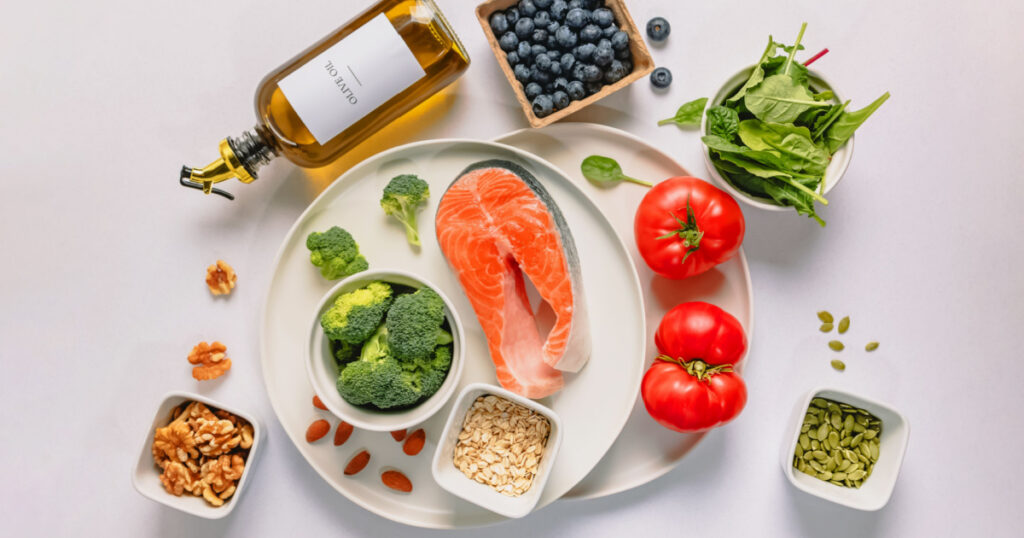 Variety of fresh, whole unprocessed food; healthy nutrition, anti-inflammatory diet products, top view