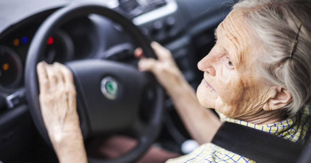 Senior woman driving a car
