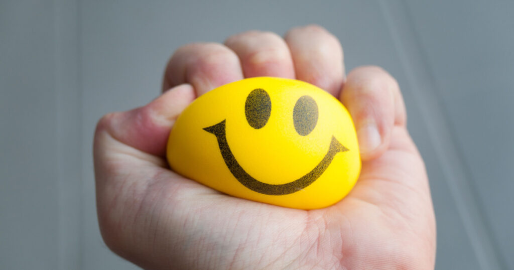 squeezing stress ball