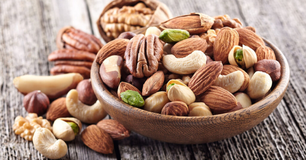 Nuts mix in a wooden plate