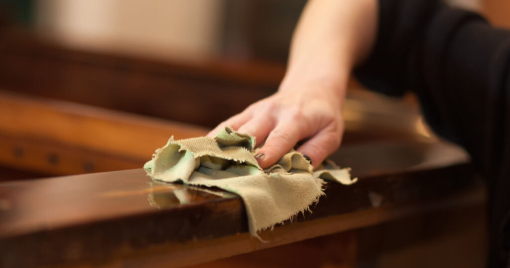 woman restoring furniture