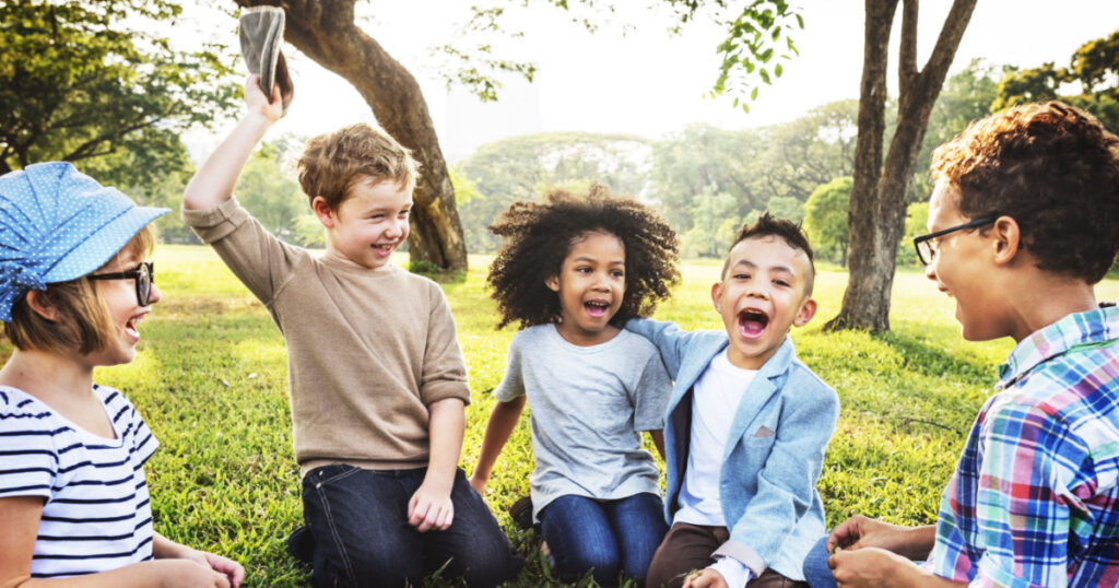 Kids Playing Cheerful Park Outdoors Concept