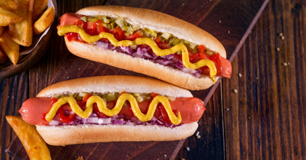 Hot Dog With Yellow Mustard, Onion, Pickles and French Fries
