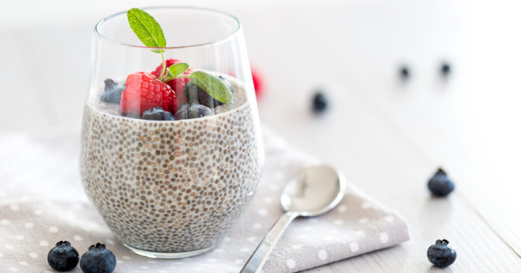 Healthy chia pudding with almond milk in a glass