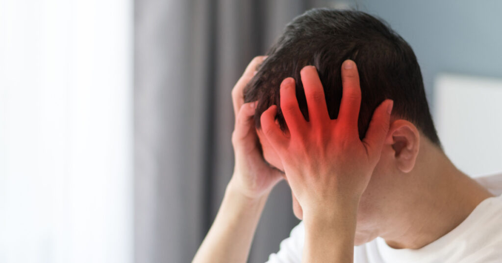 Brain diseases problem cause chronic severe headache migraine. Male adult look tired and stressed out depressed, having mental problem trouble, medical concept