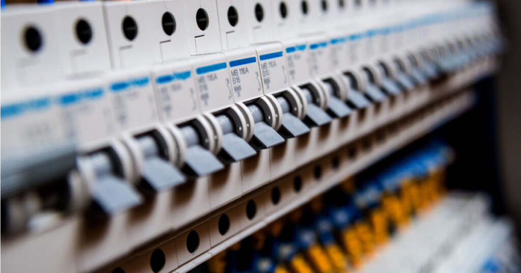 Voltage switchboard with circuit breakers. Electrical background
