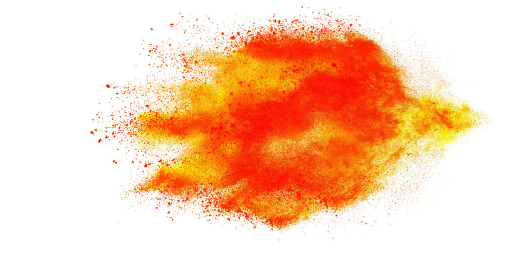 Explosion of colored powder on white background
