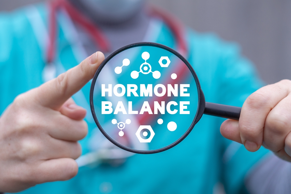 Medical and scientific concept of hormone balance. Hormonal therapy. Hormones research and innovative treatment.
