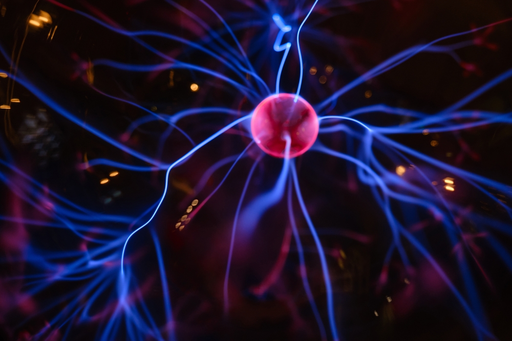 Abstract neuron background. Flashes of purple pink light on a dark background

