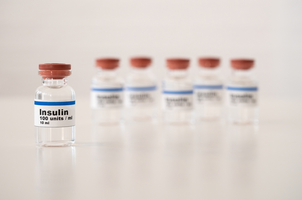 Insulin vials against a white background: properly cooling and storing insulin.
