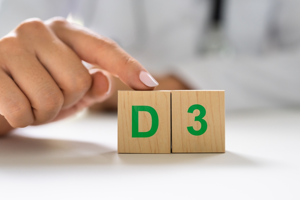 Vitamin D3 Test. Medical Doctor Hand And Pharmacy
