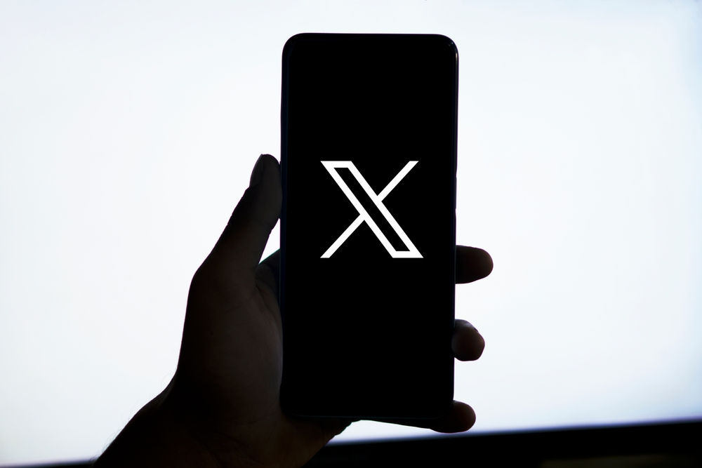 Dhaka,Bangladesh 11 August 2024: X twitter new logo on phone screen stock image.
