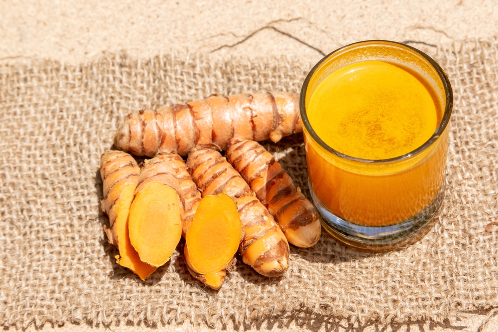 Turmeric Juice: Drink Your Way to a Healthier Life. Ideal for juice bars or smoothie brands highlighting turmeric's health-boosting properties.