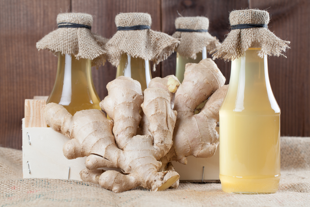 Bottles with homemade ginger syrup. Shallow dof