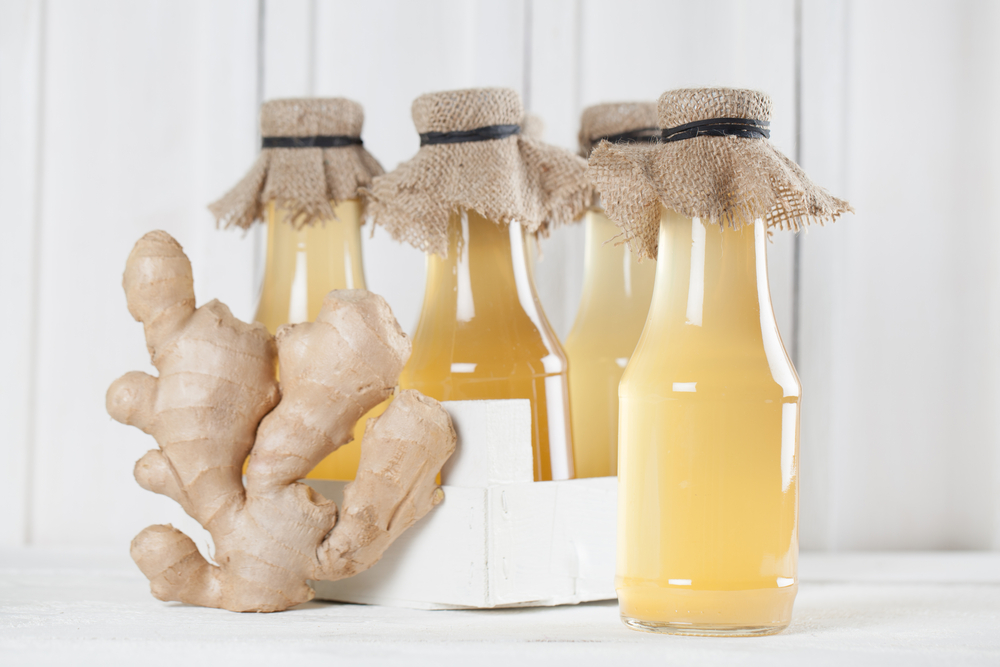 Bottles with homemade ginger syrup. Shallow dof