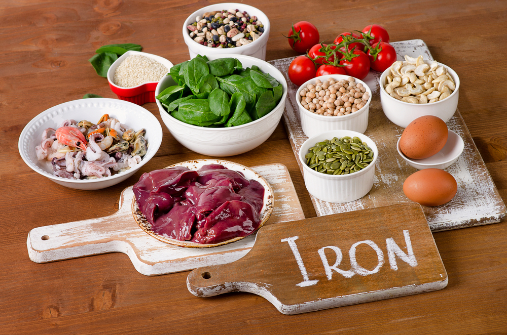 Foods high in Iron, including eggs, nuts, spinach, beans, seafood, liver, sesame, chickpeas, tomatoes.
