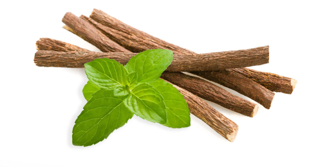 Roots licorice and mint isolated on white