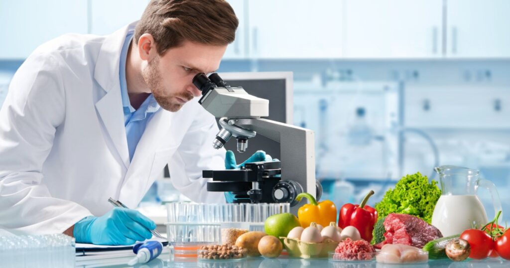 Food quality control expert inspecting specimens of groceries in the laboratory