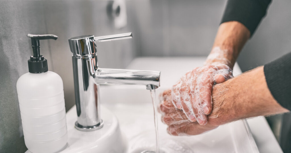 Washing hands rubbing with soap man for corona virus prevention, hygiene to stop spreading coronavirus.