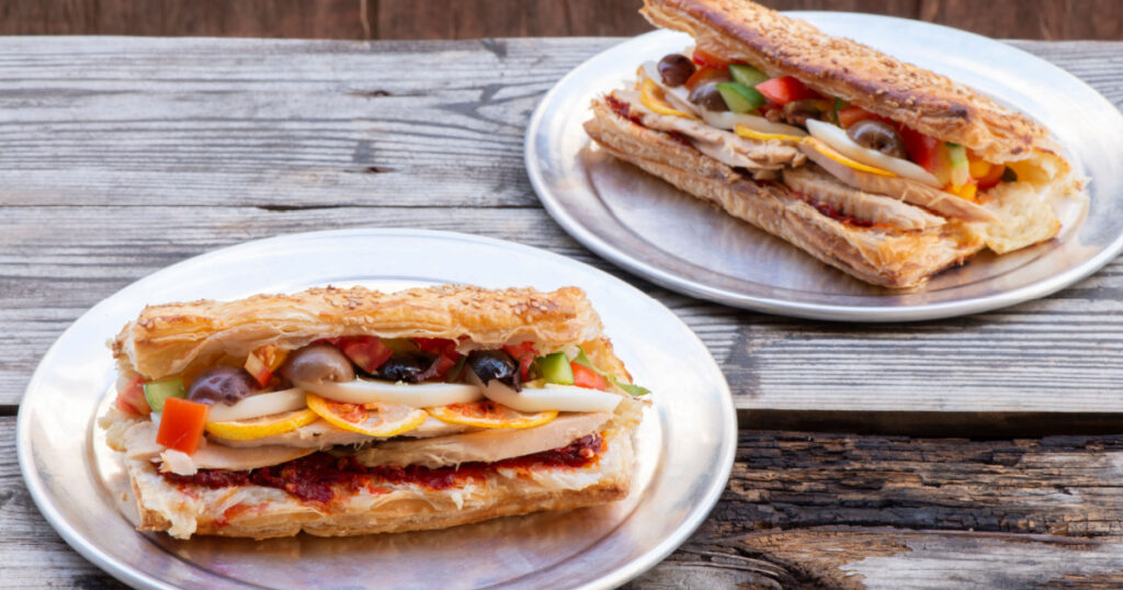 Potato Puff Pastry With Tuna, Hard Boiled Egg, Olives, Tomato Paste and Tahini Sauce