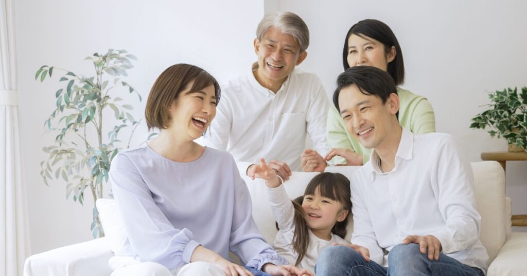 Asian family relaxing at home