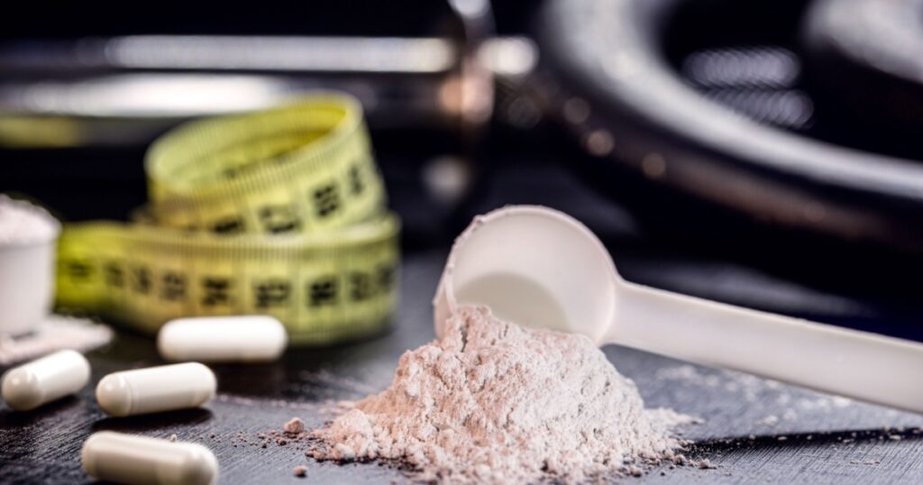 Sports supplement, creatine, hmb, bcaa, amino acid or powdered vitamin. Sports nutrition concept. bcaa, l-carnitine, creatine