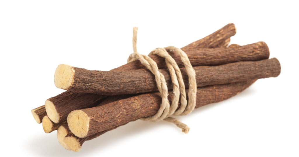 licorice roots with string isolated on white background