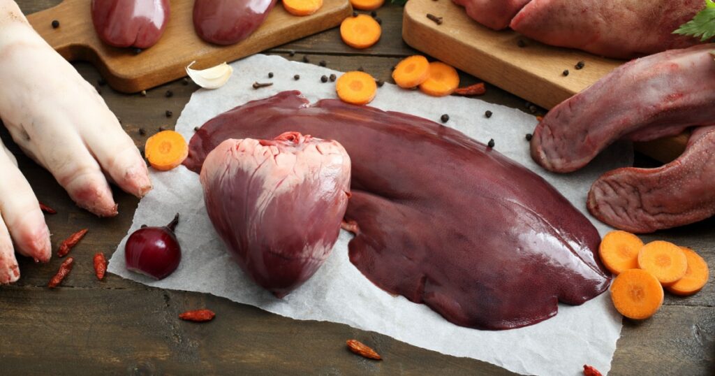 top view assorted raw pork meat on rustic table background