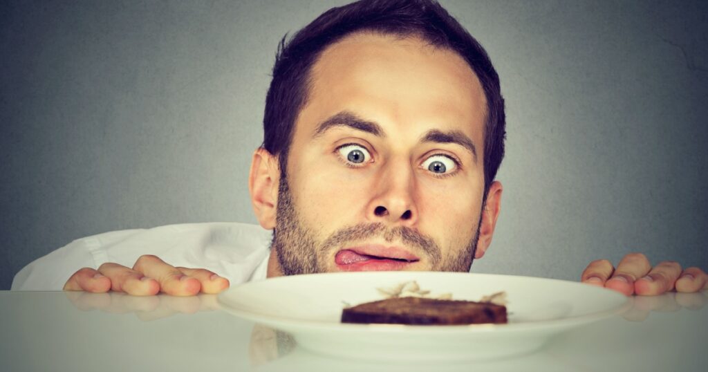 Hungry man craving sweet food