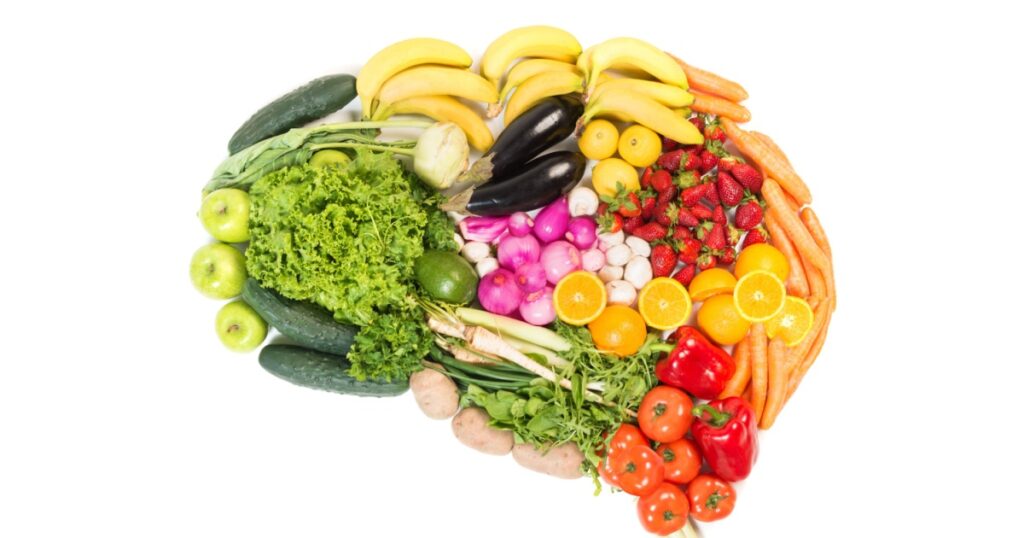 Brain made out of fruits and vegetables isolated on white background