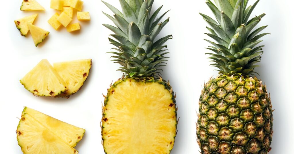 Fresh whole and cut pineapple isolated on white background. From top view