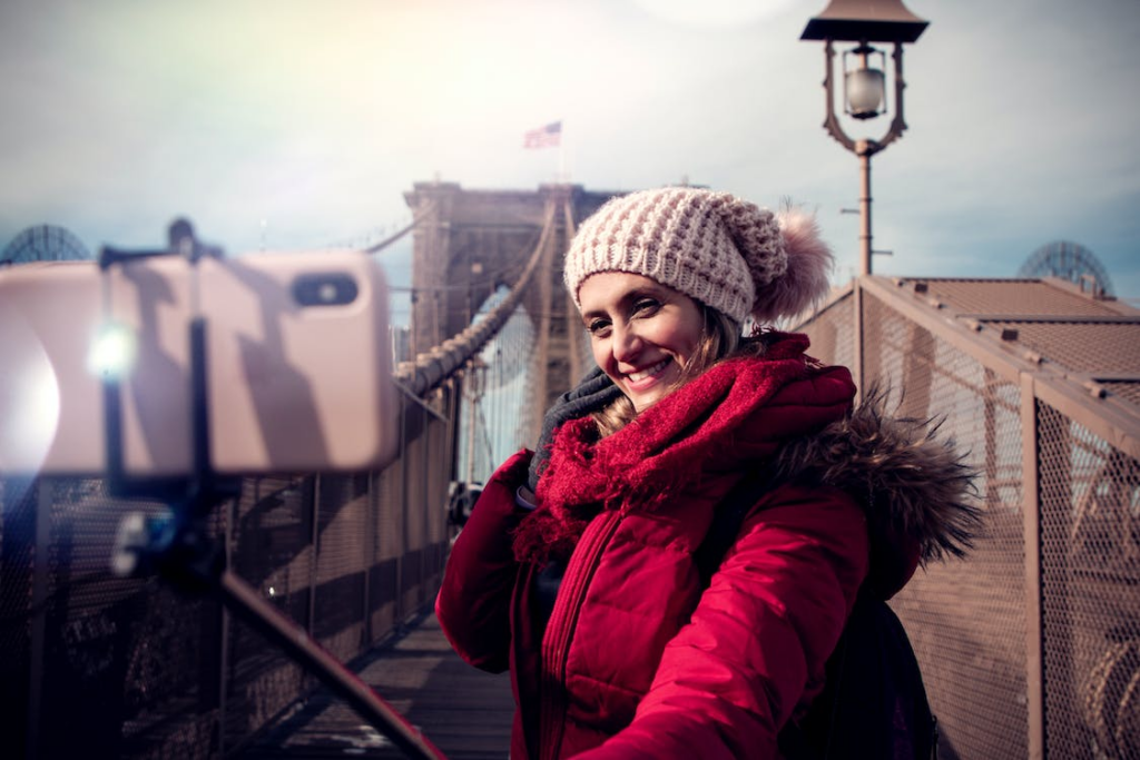 Woman Wearing Red Zip-up Hooded Jacket