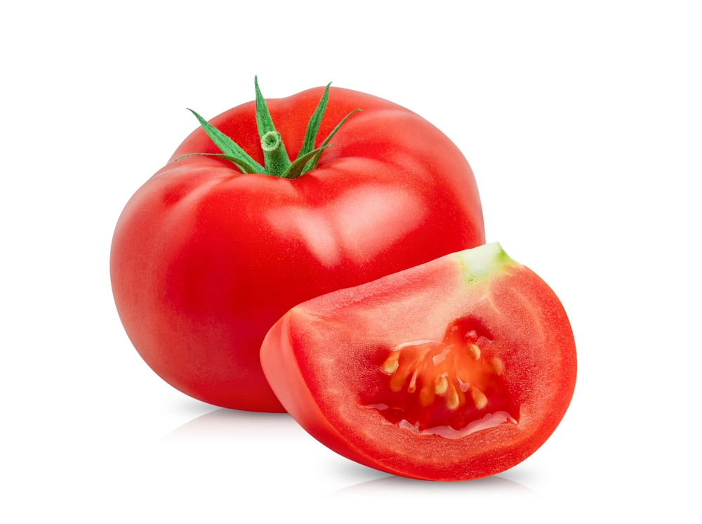 Tomato vegetables isolated on white background. One whole tomato and cut slice
