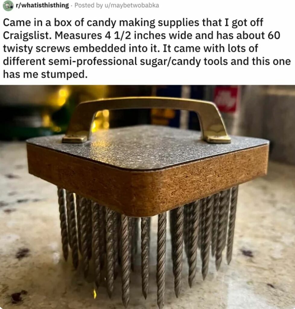 Metal handle with screws for spinning sugar.