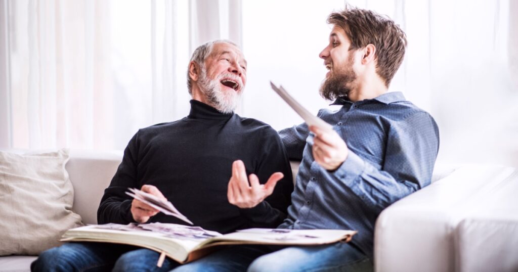 Hipster son and his senior father at home.