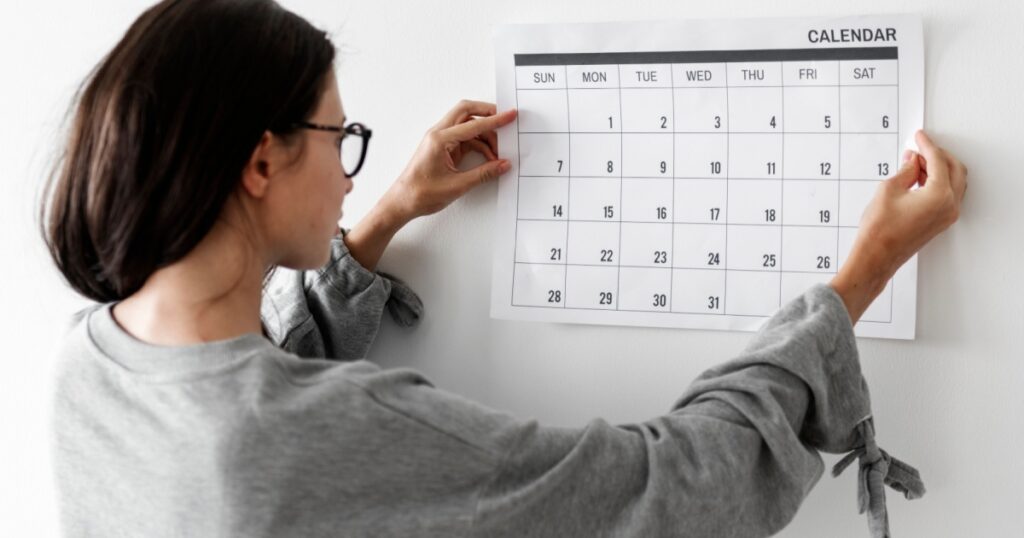 Woman checking the calendar