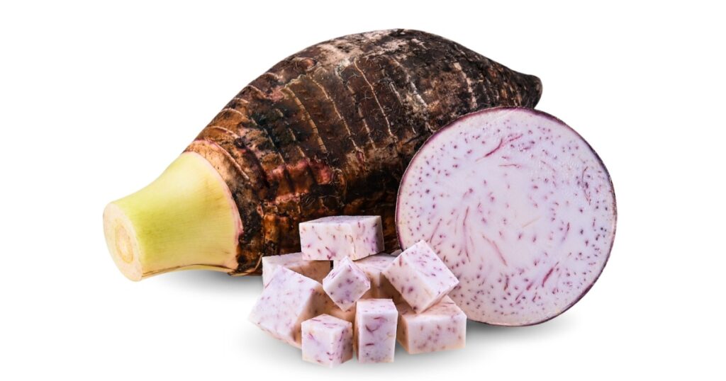 Fresh taro. Taro sliced in half and square cut. Isolated on white background