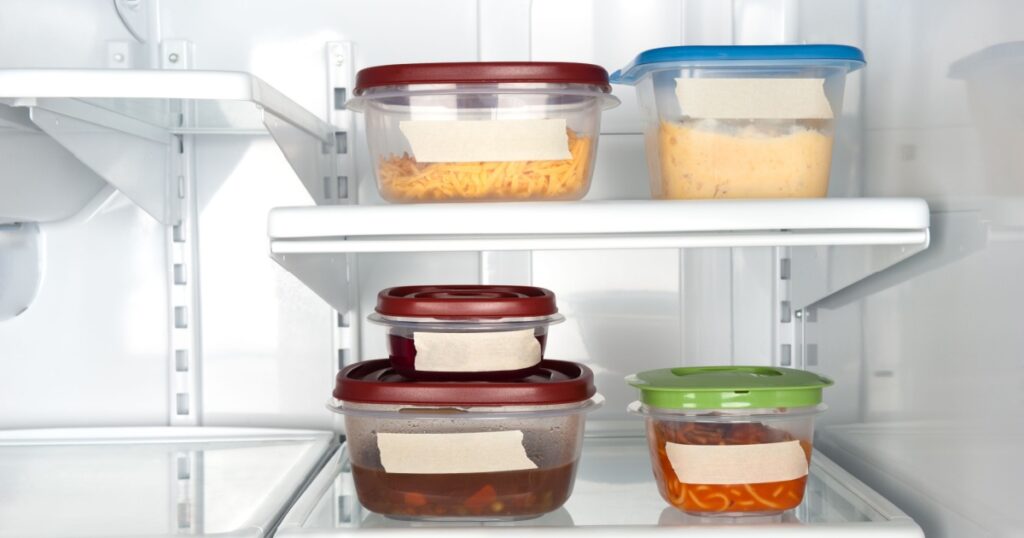 Leftovers in a refrigerator with blank tape for copy.