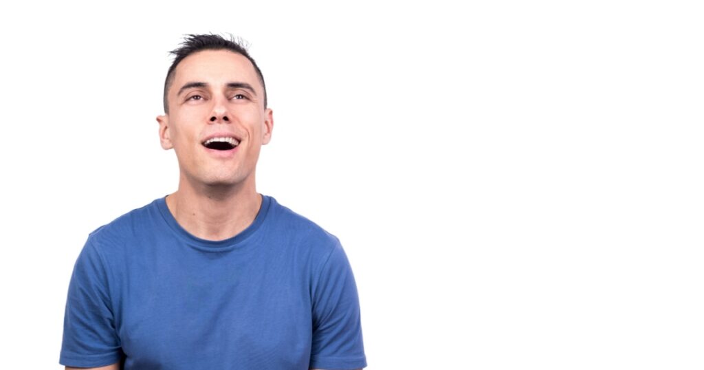 Man looking up with a smoked expression