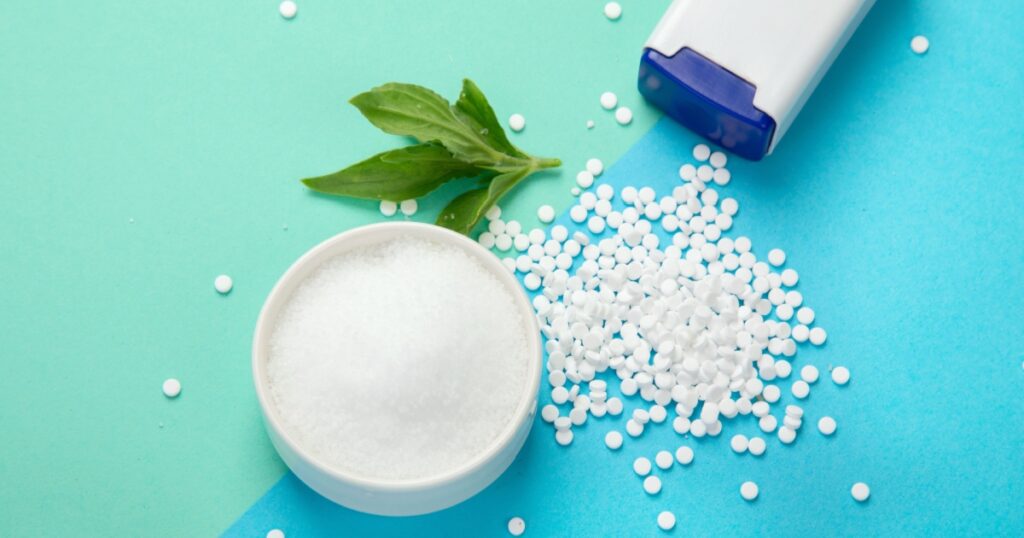 Sugar substitute on color background. Diabetic concept. Top view, flat lay, copy space