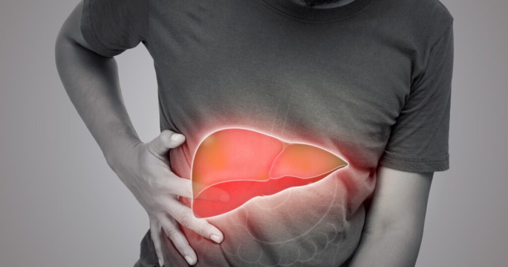 The illustration of liver is on the man's body against gray background. A men with hepatitis and fatty liver problem.