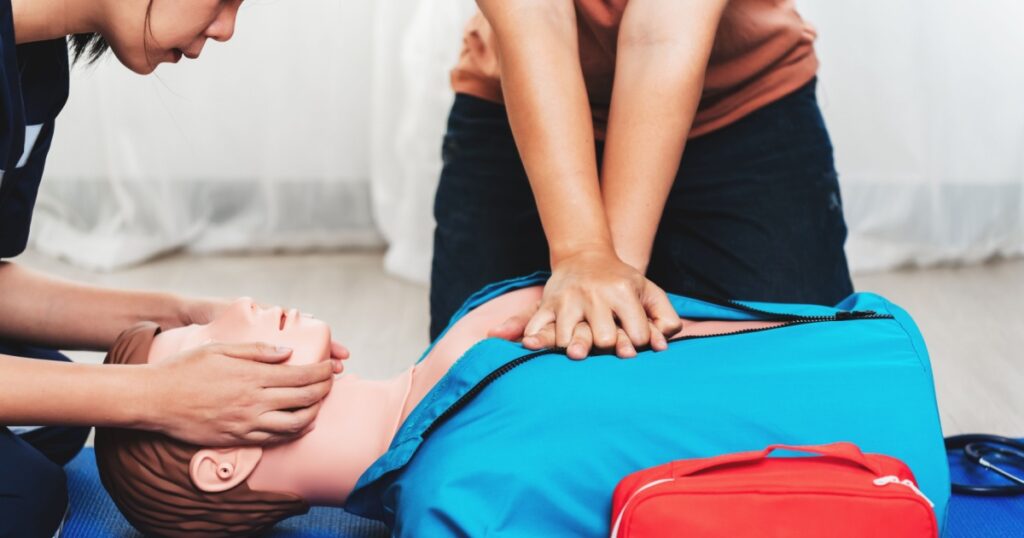 CPR Training ,Emergency and first aid class on cpr doll, Cardiopulmonary resuscitation, One part of the process resuscitation on unconscious person.