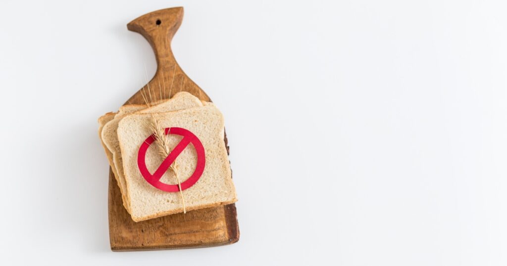 celiac disease background. Bread with crossed spikelet. Celiac world day