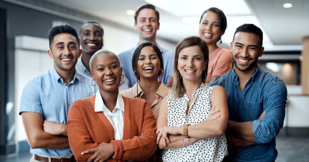 Diversity, portrait of happy colleagues and smile together in a office at their workplace. Team or collaboration, corporate workforce and excited or cheerful group of coworker faces, smiling at work