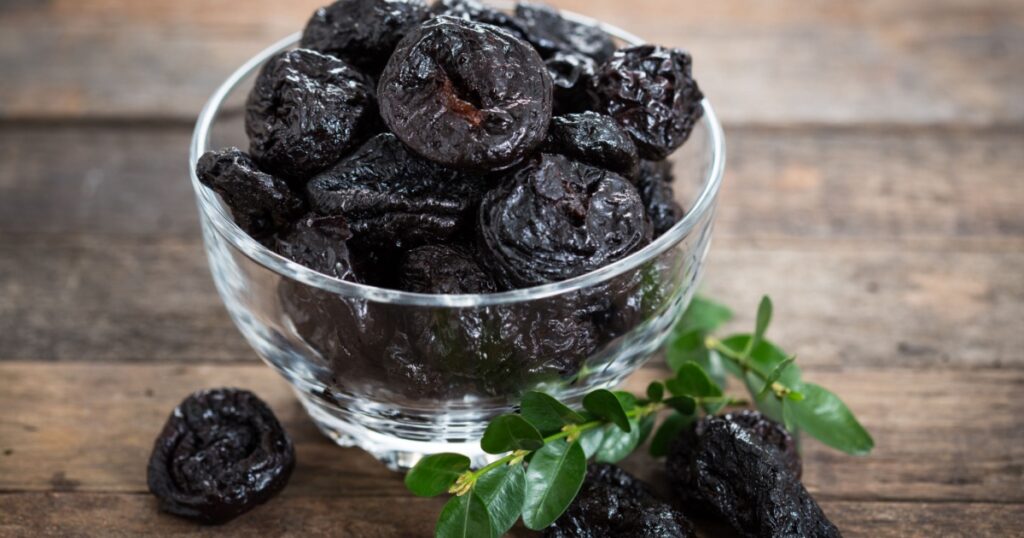 Dried plums - prunes in the bowl