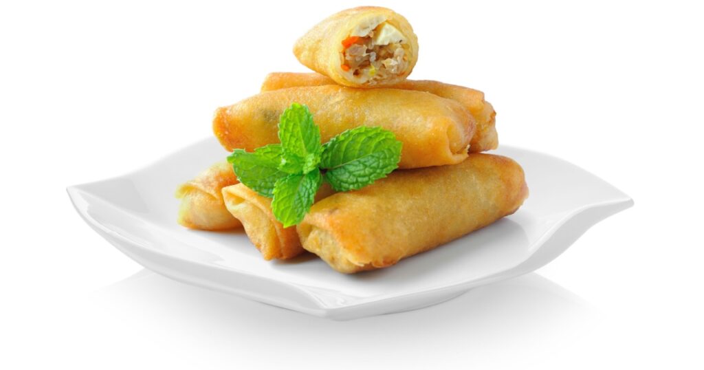 Fried Chinese Traditional Spring rolls food in ceramic plate (beautiful shape) on white background