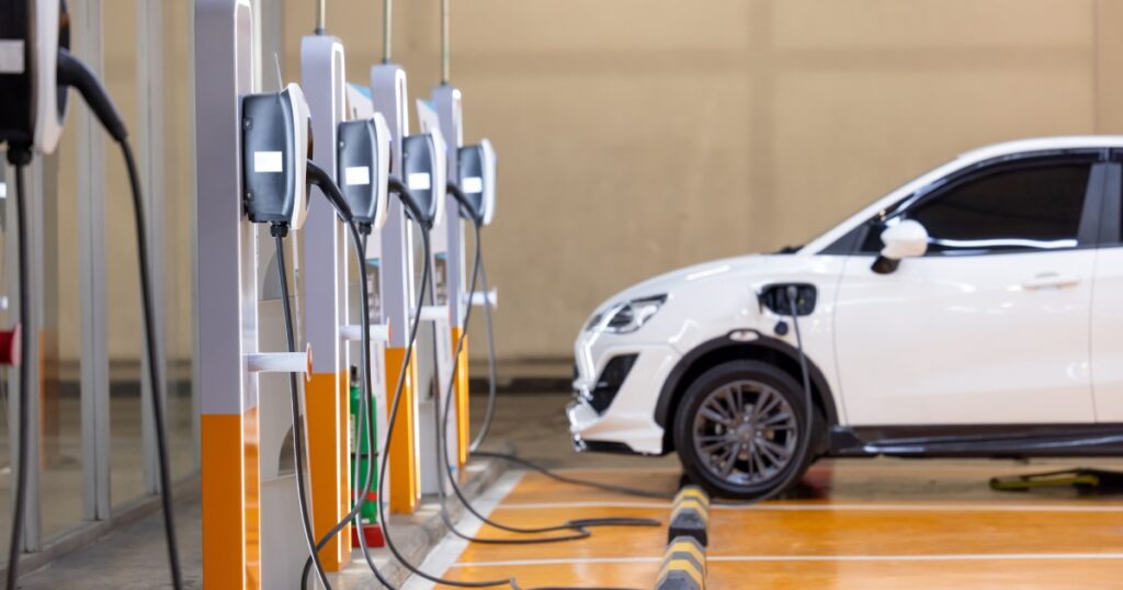 EV charging an electric car. Power supply for electric car charging. Socket for electrical car battery charger.