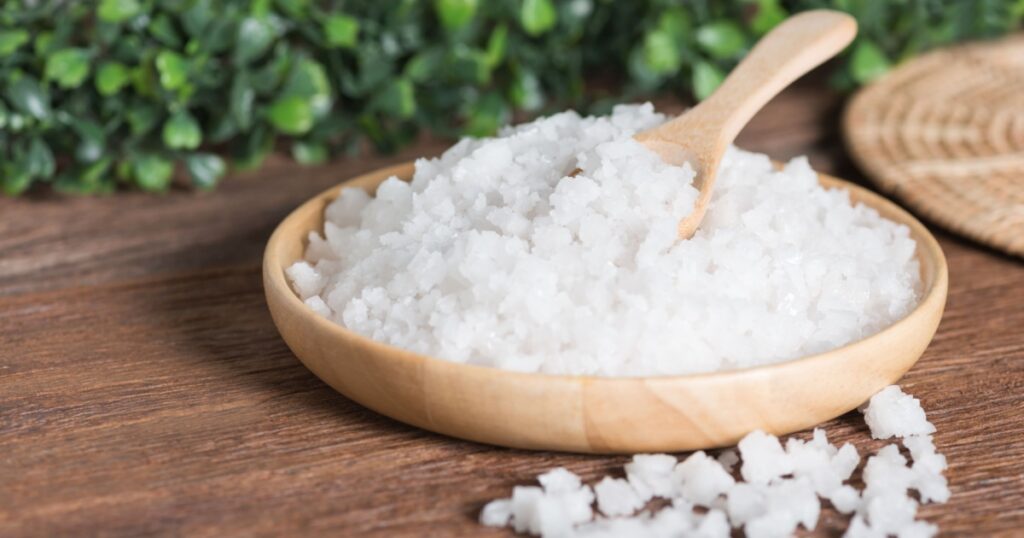 Sea salt epsom in wood plate.
