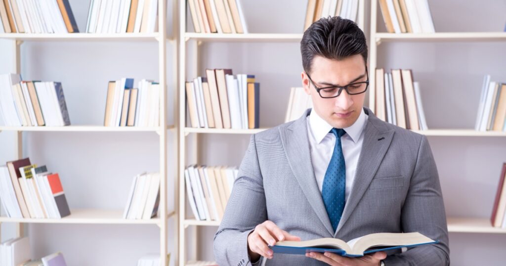 Business law student working studying in the library